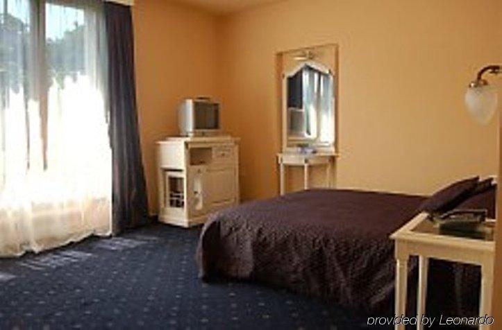 Elite Hotel Oradea Pokoj fotografie